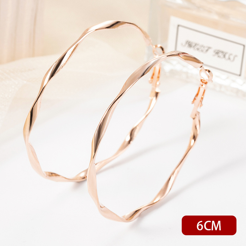 H1033 twisting circle model gold 6cm