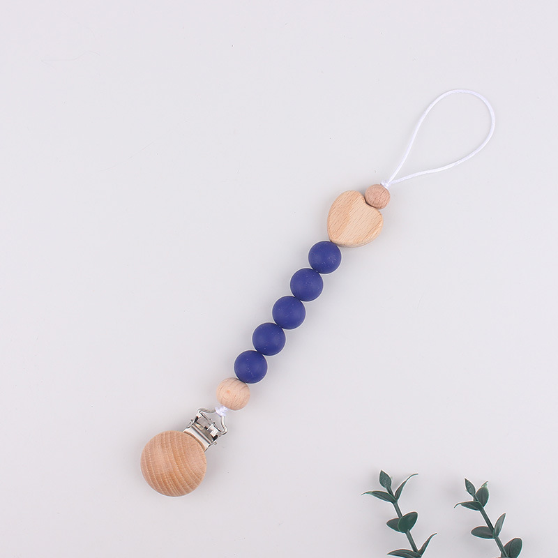 Clip de tetina de tres agujeros redondo de beech para calmar al bebé tetina de silicona de goma de diente anti-caída cadena