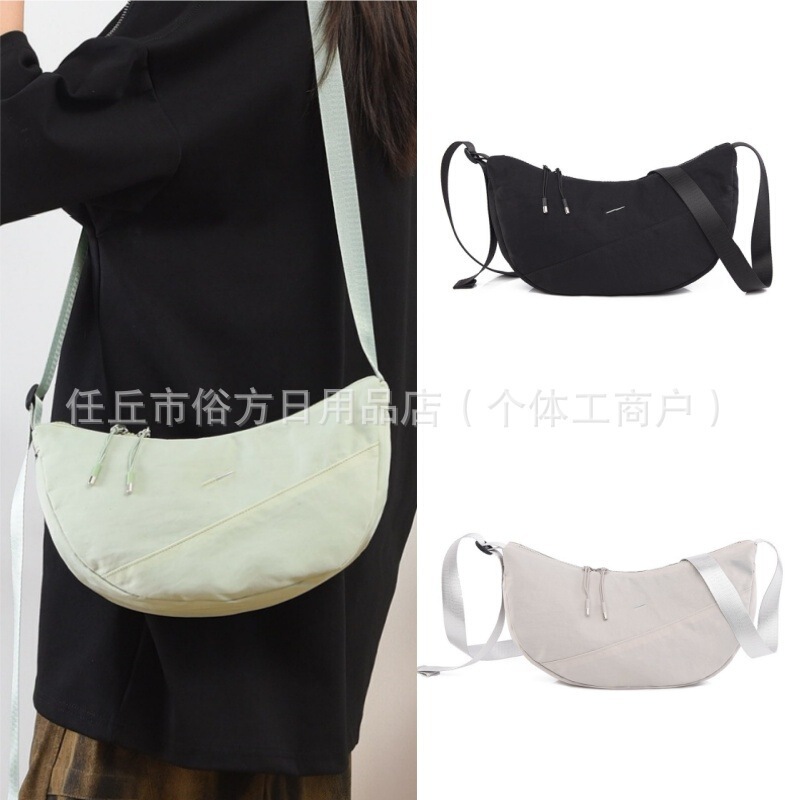 New style, durable dumpling-shaped bag, versatile solid-color shoulder bag, trendy brand wholesale, crescent-shaped underarm bag for women, casual style New style, durable dumpling-shaped bag, versatile solid-color shoulder bag, trendy brand wholesale, crescent-shaped underarm bag for women, casual style