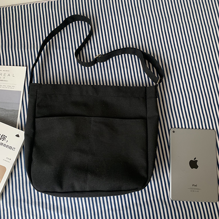 2024 nuevo estilo estilo estilo perezoso bolso de lona de mensajero de color sólido en blanco bolso escolar de estudiante bolso de hombro de estilo universitario ins