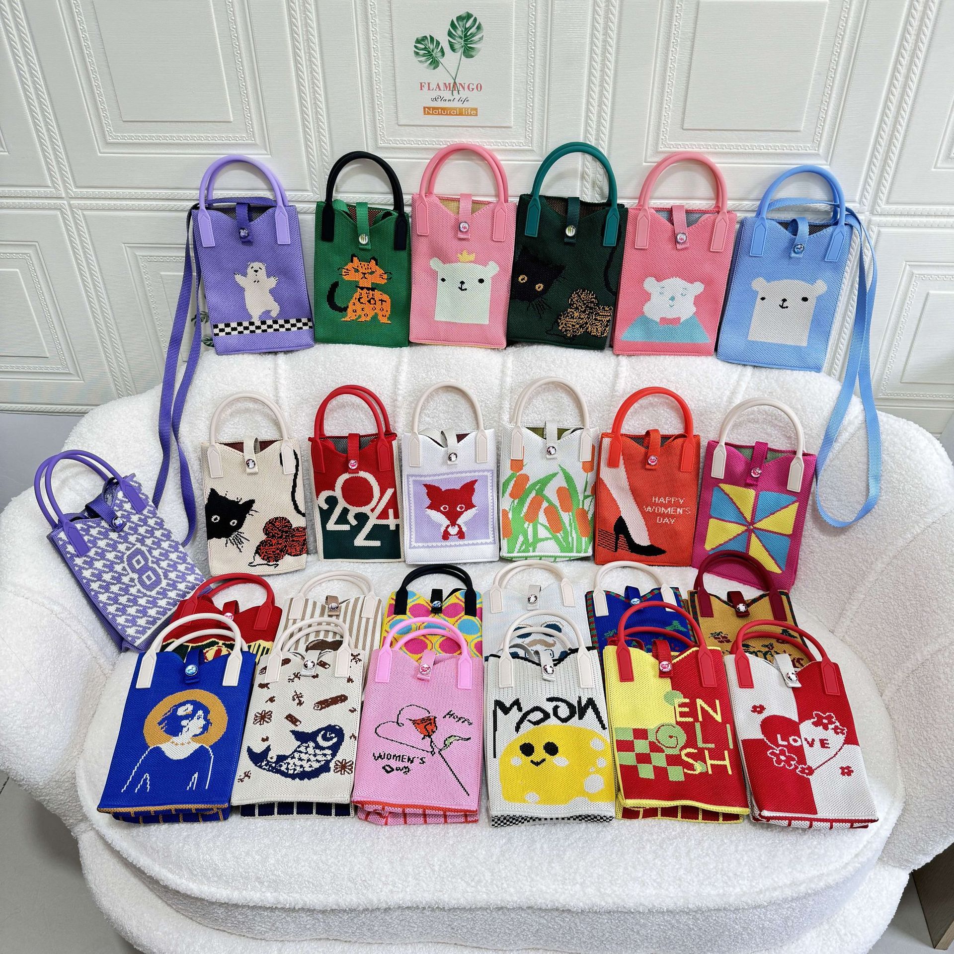 Handheld small design cartoon knitted universal shoulder bag