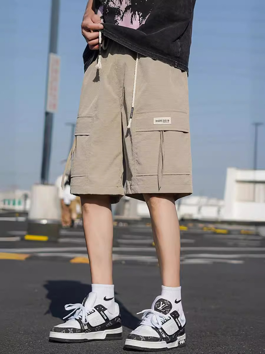 Pantalones cortos de trabajo de verano para hombres, pantalones de secado rápido de hielo, pantalones de tendencia, pantalones largos y casuales.