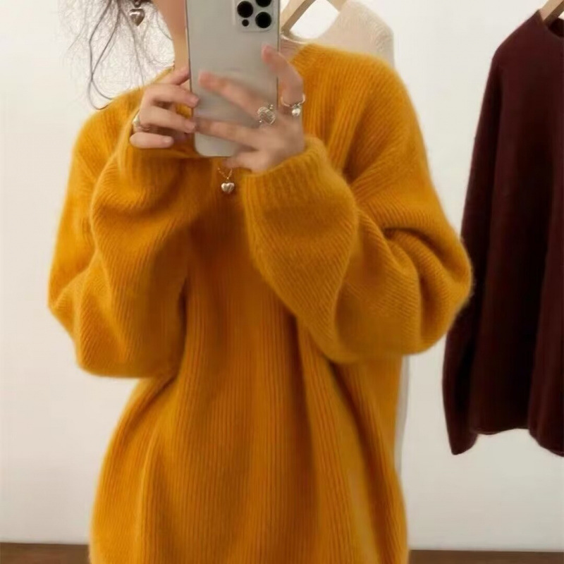 Demi-season solid knitted trend sweater with a round collar