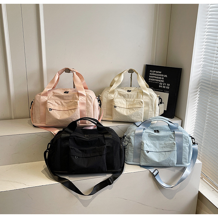 Bolsa de ejercicios de gran capacidad, bolsa de yoga deportiva simple, nuevo paquete de viaje de negocios portátil de color sólido coreano.