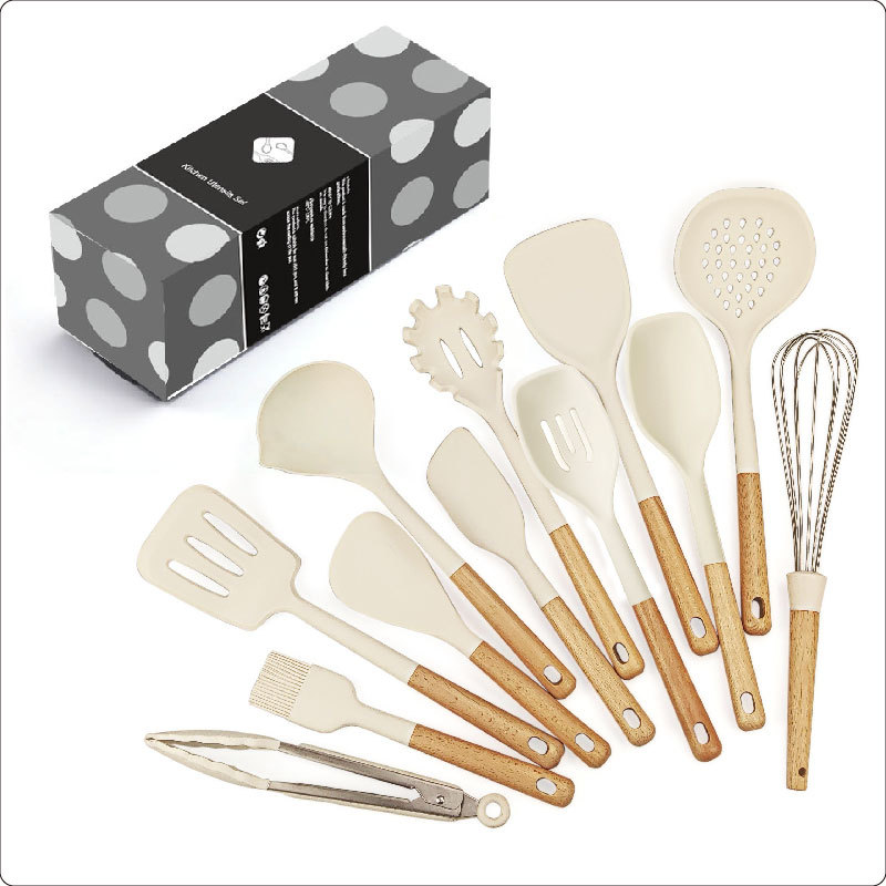 Nuevo mango de madera utensilios de cocina de silicona transfronterizo dedicado 12 piezas de alta temperatura resistente antiadherente sopa cuchara colador pala traje