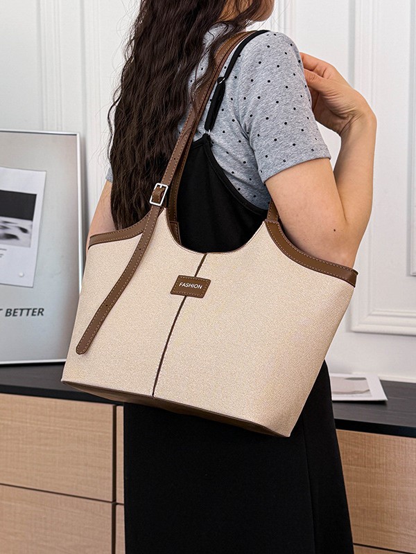 Bolsa de mano retrógrada de nicho para mujeres 2026 comercio exterior nuevo color de choque de alta calidad bolso de hombro de gran capacidad