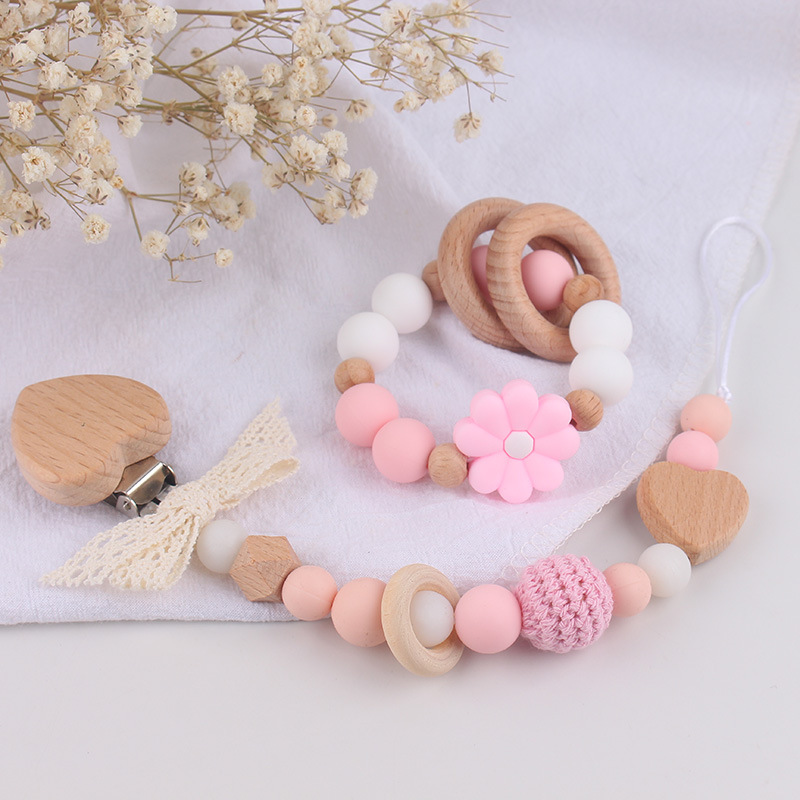 Nuevo juguete de mano para bebé con sonajero, los molares de los niños pueden morder el castaño de haya, margarita, pulsera de flores, mordedor