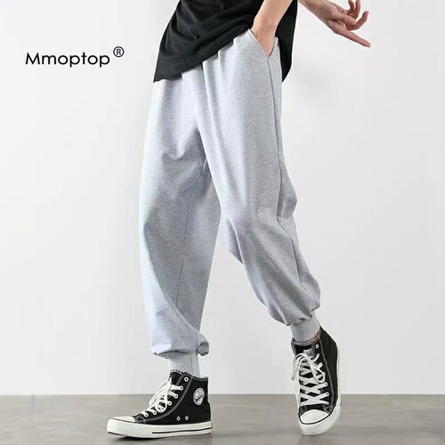 Summer lightweight pants for men: trendy gray ankle-banded, loose-fit sports basketball sweatpants—versatile, knitted, and cropped.