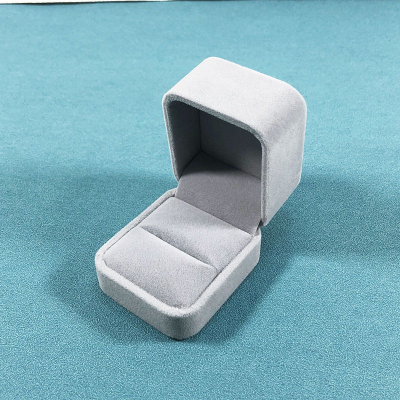 Light gray ring box; rounded velvet box
