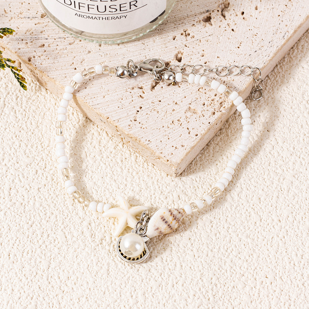 Bracciale con perline e stella marina gioiello da spiaggia_voghion.com