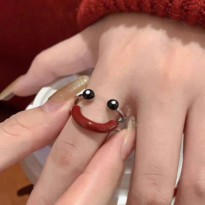 Oil dripping smiley ring