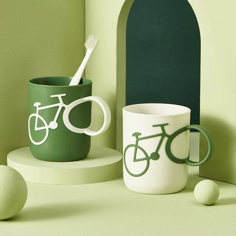 Taza de cepillo de dientes creativa taza de enjuague bucal pareja mango de bicicleta taza de lavado dormitorio de estudiantes simple taza de cepillo de dientes al por mayor