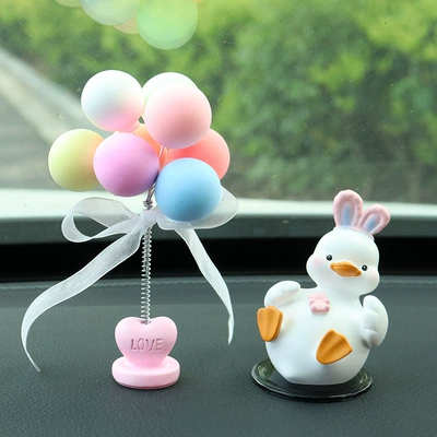 Internet Celebrity Duck Car Ornaments: Car ornaments - duck-lying-down-comes-with-anti-slip-mat-colorful-shaking-head-balloon