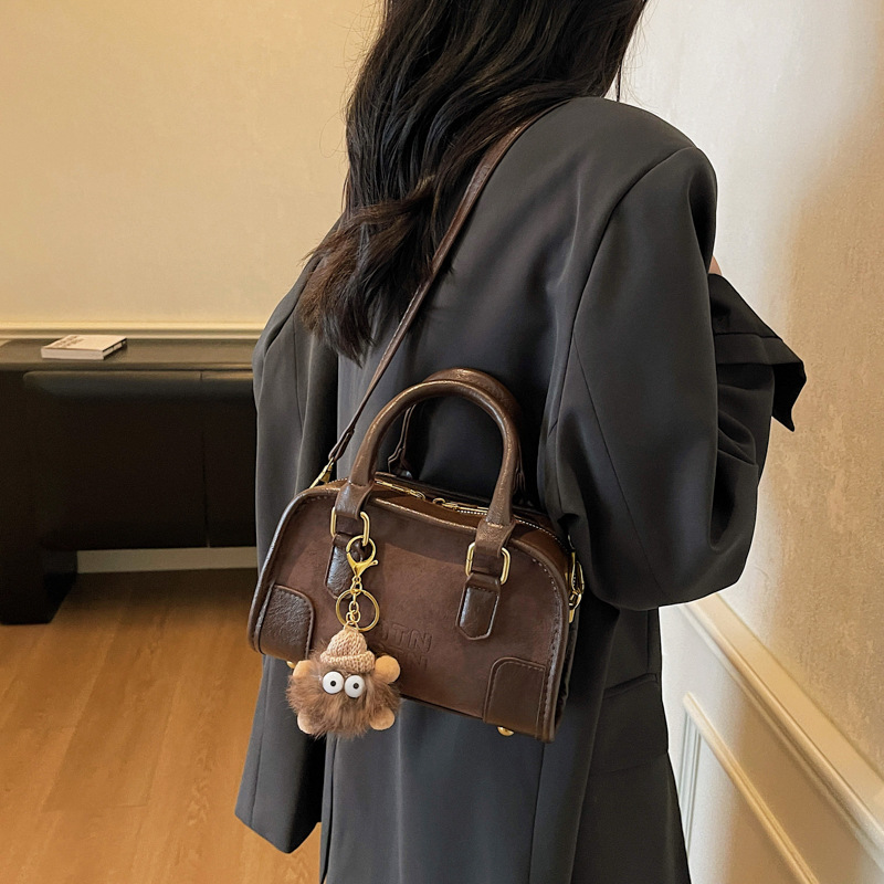 Cross-border retro bolso de mano mujer 2026 nuevo popular bolso de viaje nicho de hombro mochila