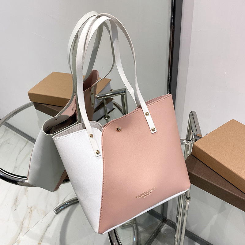 Bolsas de mujer al por mayor de comercio exterior 2023 nueva moda bolsas de hombro de moda personalidad bolsas de tote de color una bolsa transfronteriza