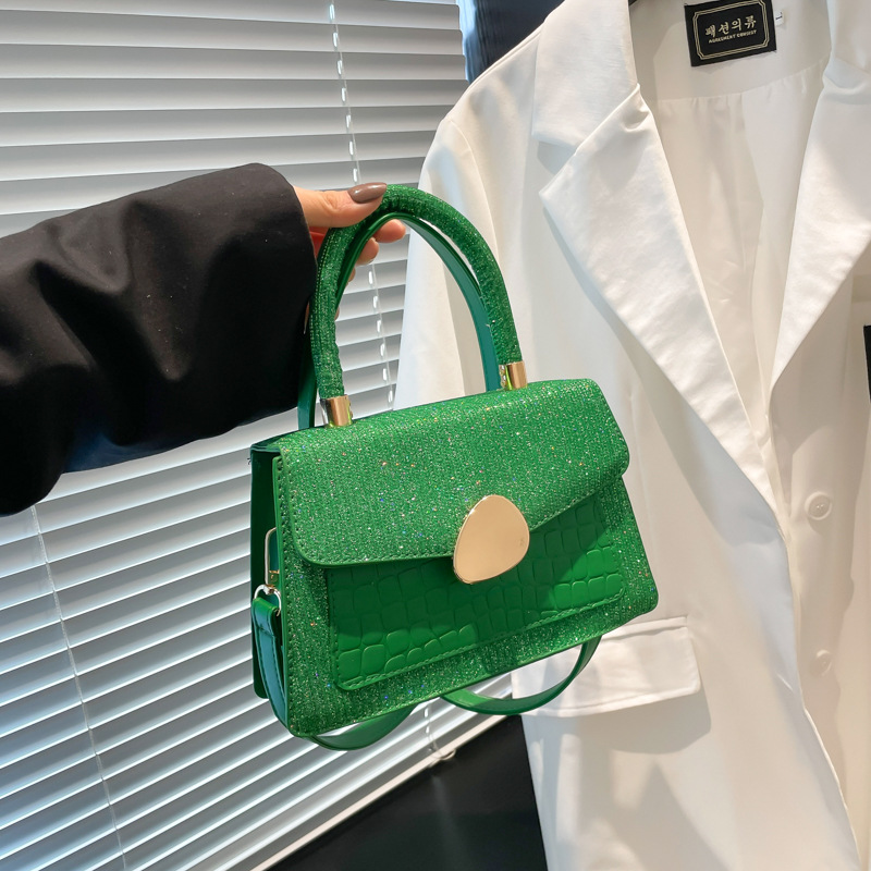 Hong Kong retro caramelo bolso de mujer 2025 moda nueva mochila de moda estilo extranjero cocodrilo empalme bolso pequeño