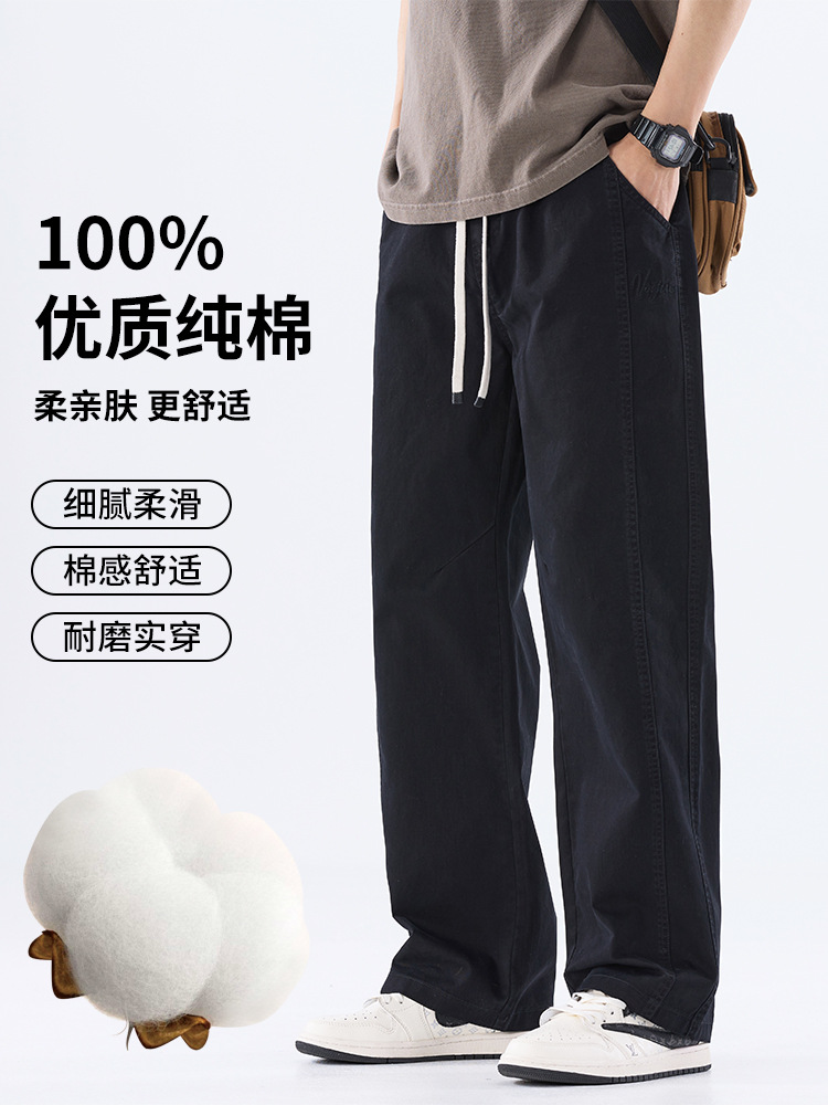 綿のカジュアルなズボンの男性のストレートのゆったりしているズボン2025夏の薄いタイプのファッションの防風傘兵の広い足のズボンの男性