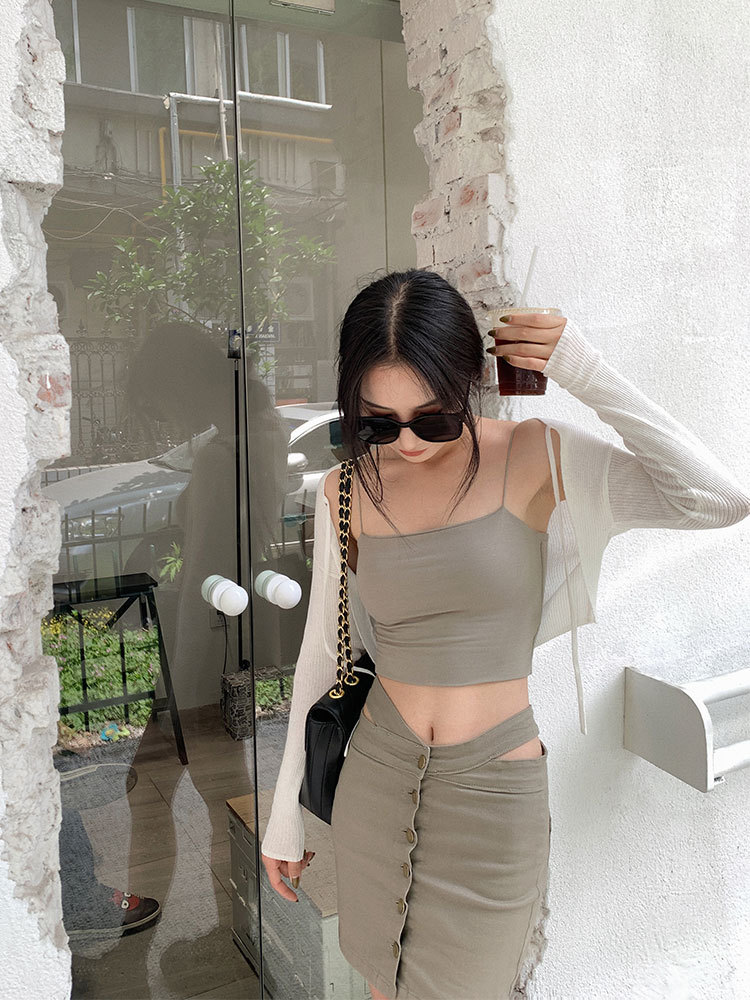 Estilo francés pequeño Chaleco de punto corto protector solar cardigan mujeres chal 2023 verano nuevo estilo con falda fuera blusa moda