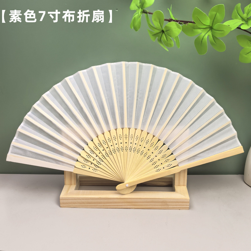 Solid color green round fan