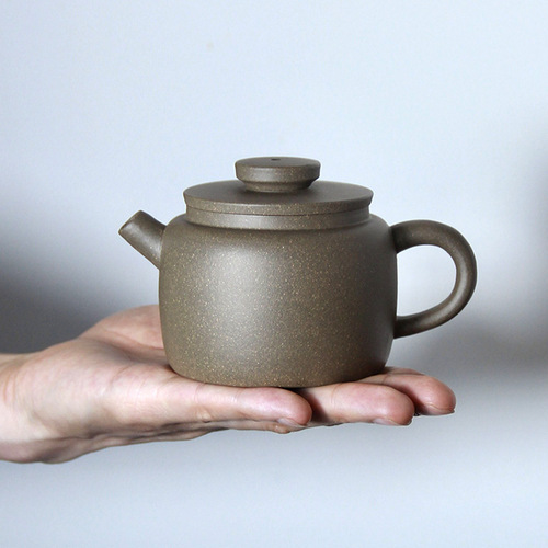 Wholesale Yixing purple sand pot pure handmade raw ore Huanglongshan section mud ball Kongde bell pot nozzle drinking teapot tea set