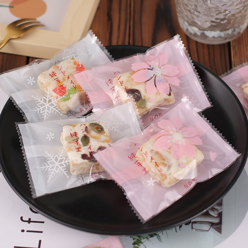 Nueva bolsa de embalaje crujiente de copo de nieve bolsa de dulces para hornear turrón máquina de galletas bolsa de sellado turrón leche Jujube bolsa de embalaje al por mayor