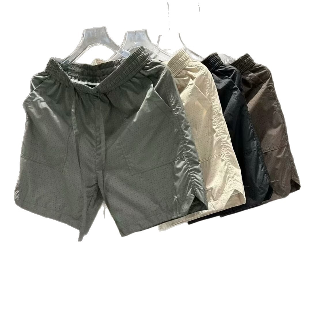 Pantalones cortos de malla transfronterizos estadounidenses de estilo de moda masculino delgados de diseño de nicho sueltos grandes pantalones deportivos casuales de cinco puntos