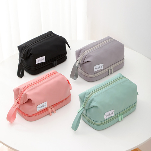 New double-layer cosmetic bag with large capacity and good looks, portable women's storage bag, Internet celebrity hand-held toiletry bag wholesale