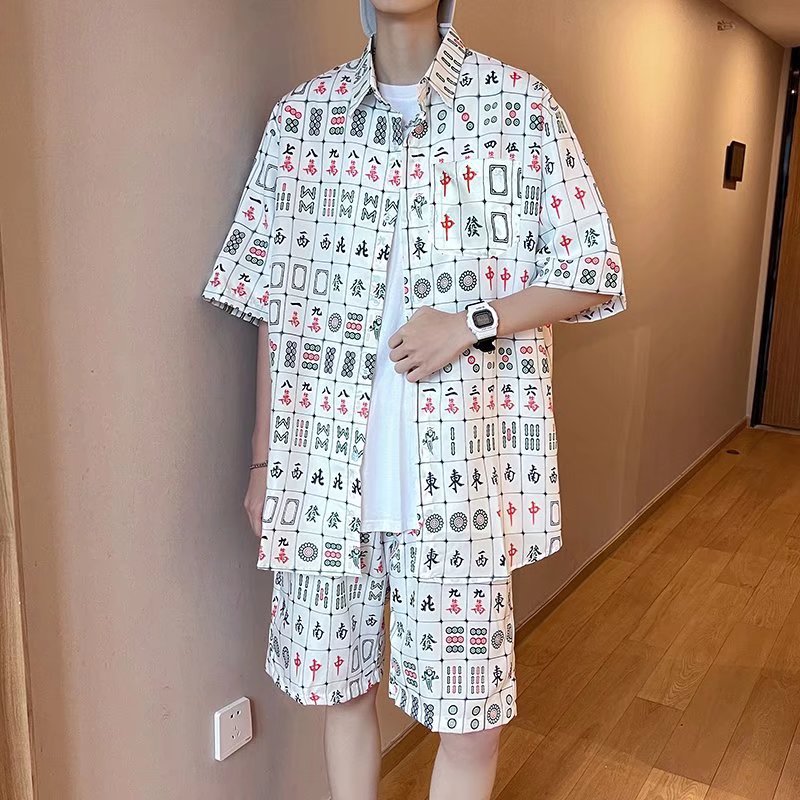 Top y pantalones cortos traje