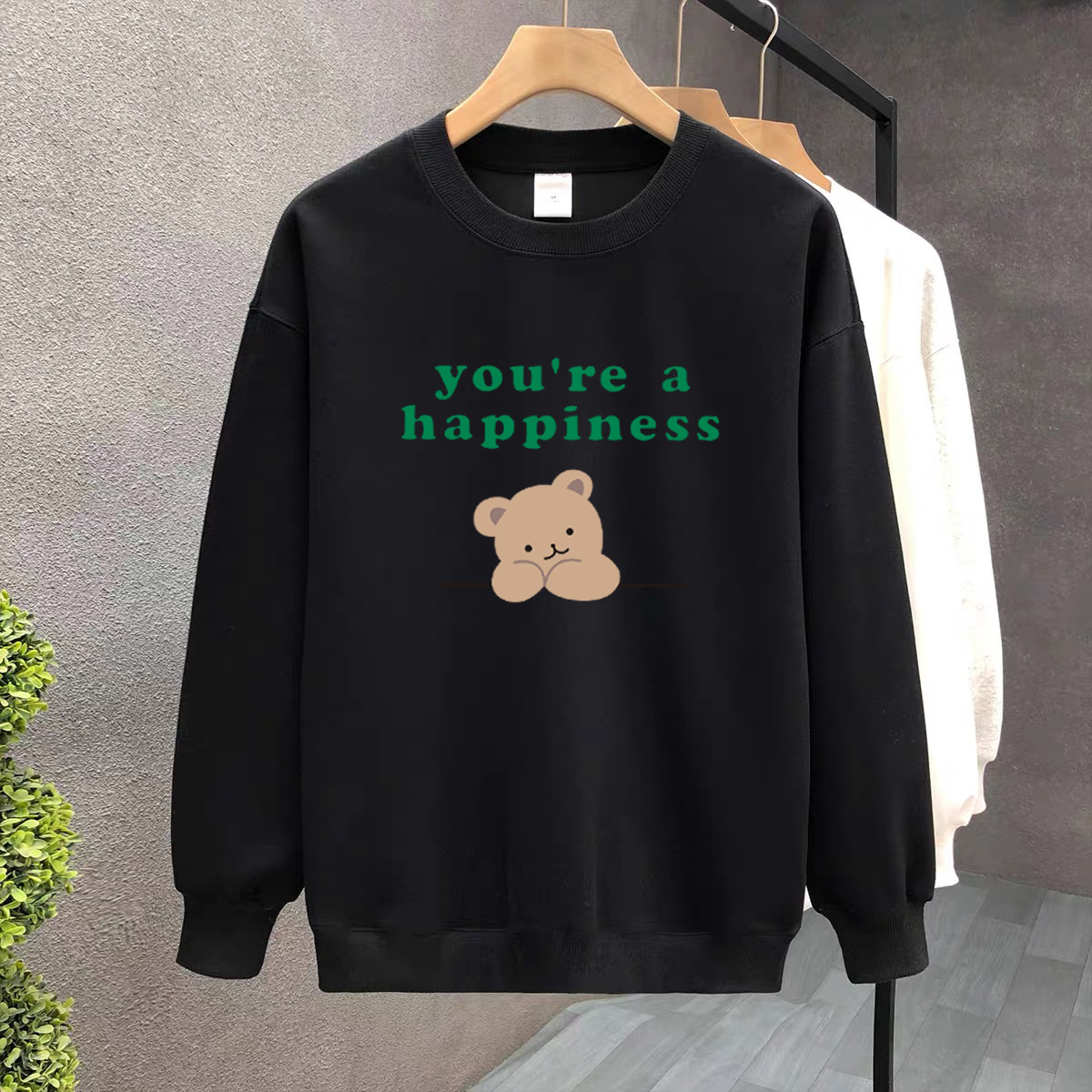 Suéter de algodón negro pesado de alta gama para mujeres 2025 otoño y invierno nuevo estilo europeo y americano camiseta de manga larga fondo suéter de estudiante