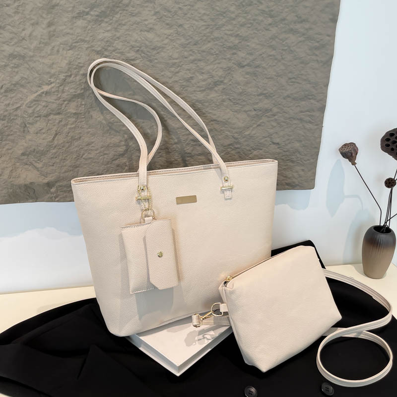 Simple paquete coreano de gran capacidad para niños y madres 2025 nuevo tipo de bolso para mujeres relajado sensación suave hombro bolso axilar