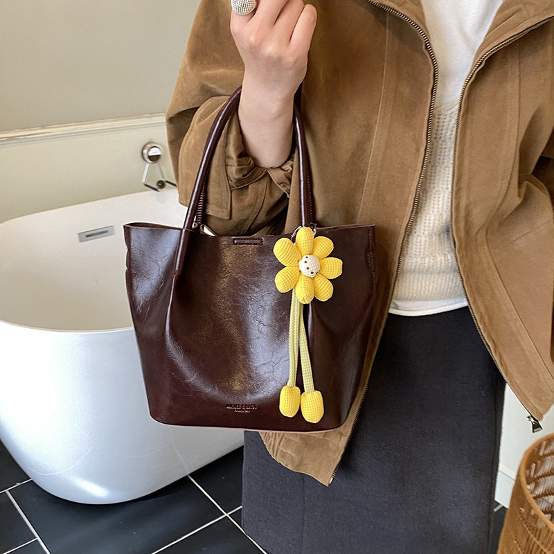 Nicho Zhong canasta de verduras de alto nivel, bolso de cubo, mujer 2025 nuevo retro bolso de trabajo, mochila de viaje