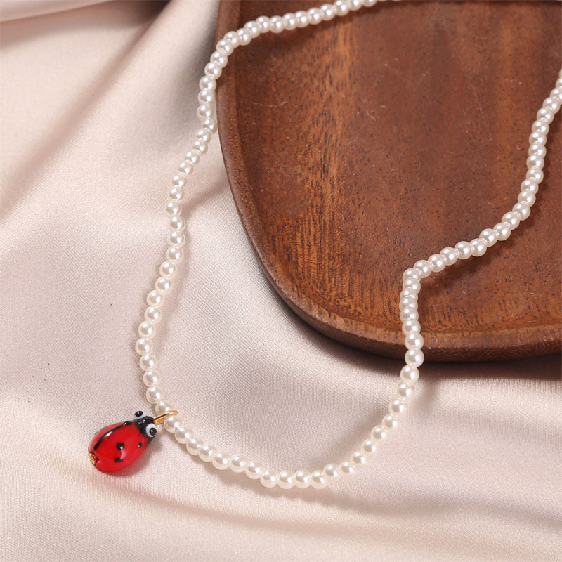 Fashion Handmade Pearl Ladybug Alloy Necklace Wholesale display picture 3