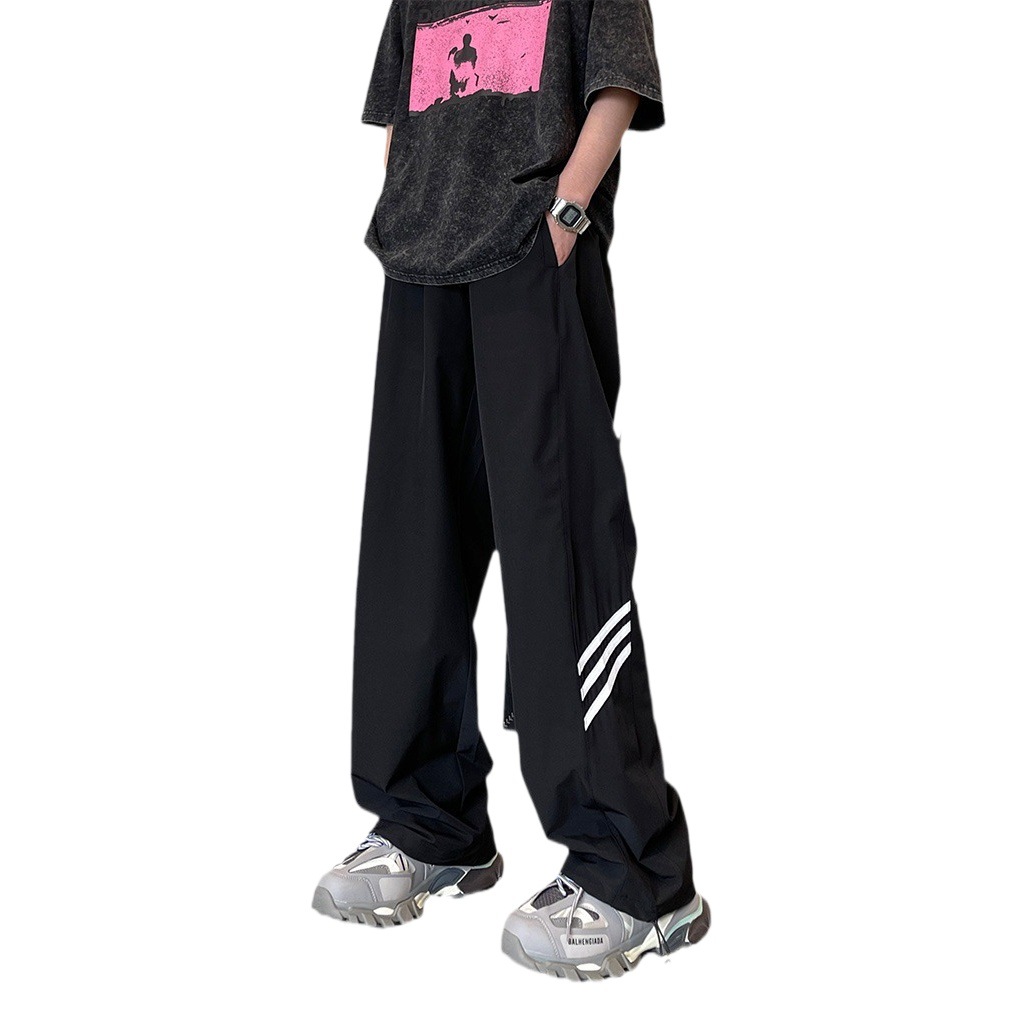 Pantalones de pierna ancha de secado rápido de calle alta estadounidense hombres y mujeres otoño nuevo casual suelto todo partido hip hop Rush pantalones moda masculina