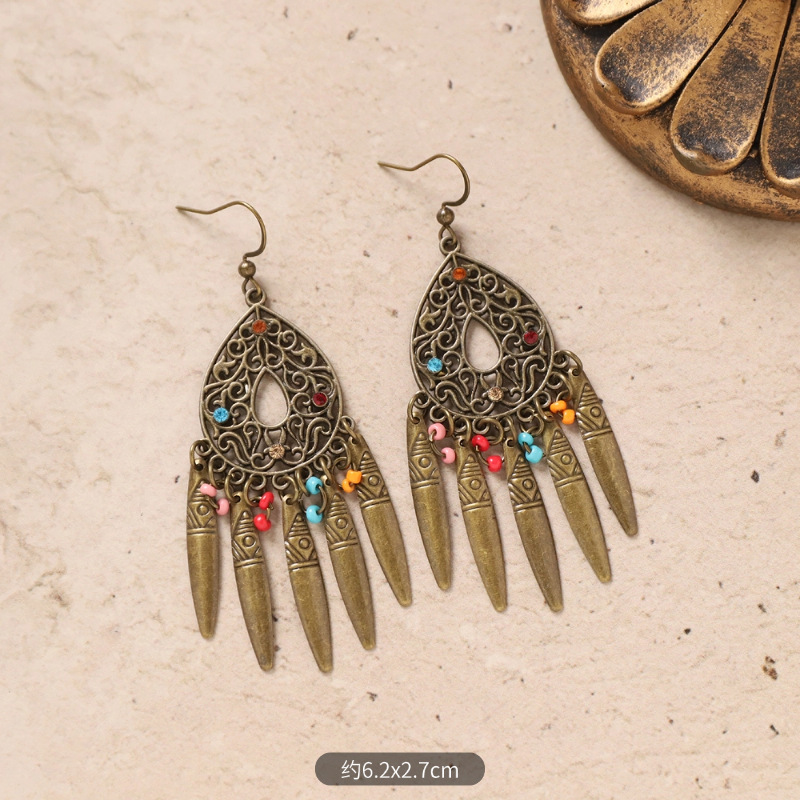 35-Bronze colored hollow tassels