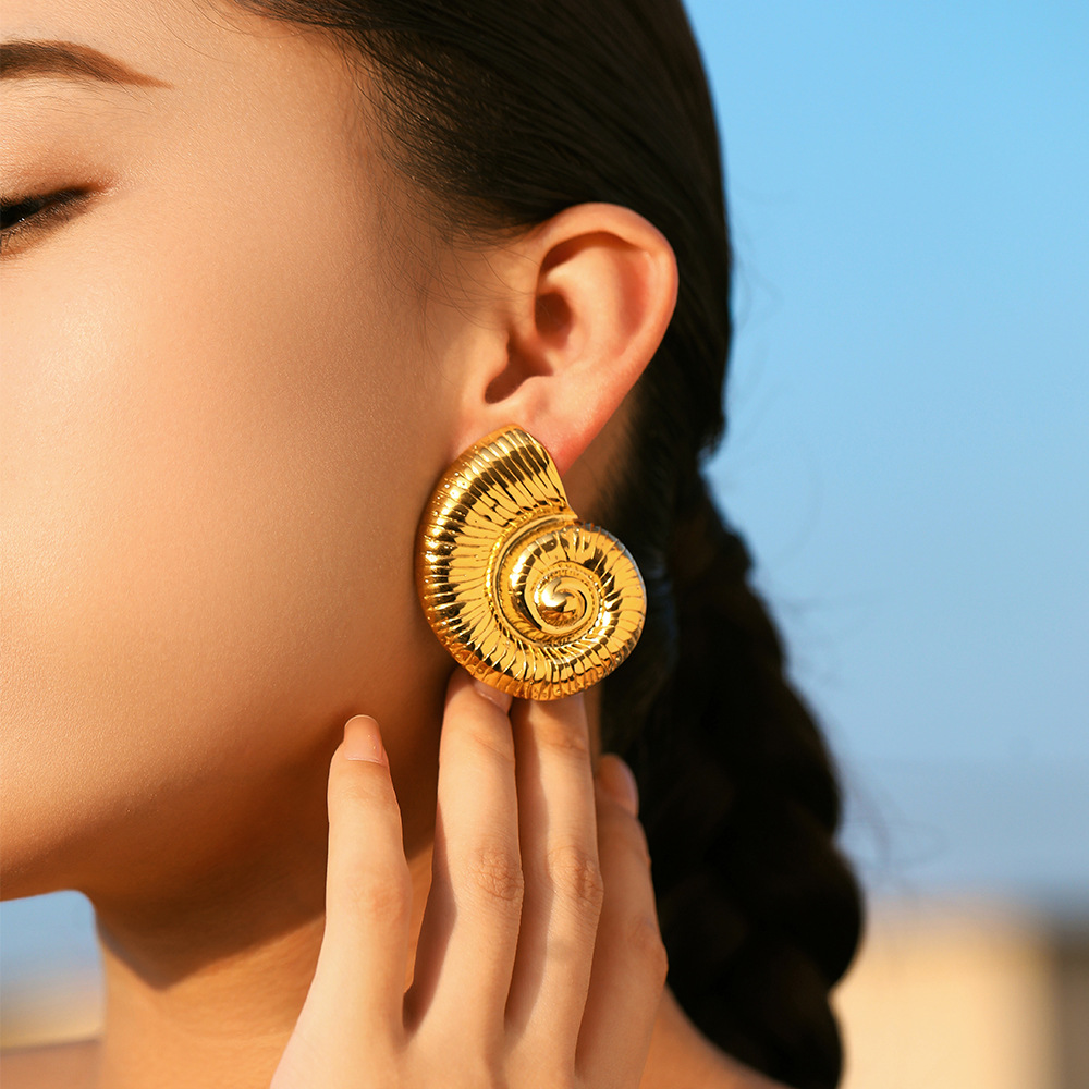 TENA europa y americana de acero inoxidable exagerado pendientes de nicho de alto nivel de diseño de conchas de mar de viento de titanio pendientes de acero joyas de orejas