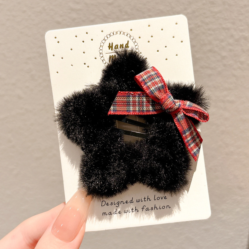 1 ¿ lazo, peluche negro, horquilla de estrella