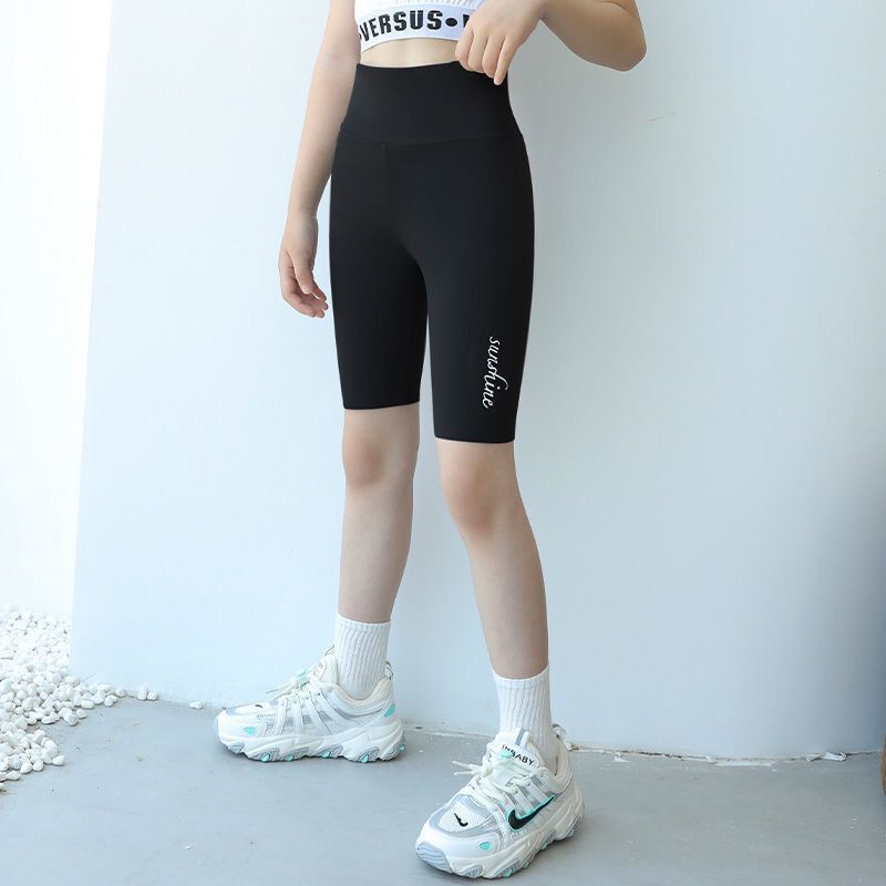 Pantalones de tiburón de cinco puntos para niñas pantalones de yoga de desgaste exterior de cintura alta delgada de verano para niños medianos y grandes leggings Barbie para niños pantalones cortos