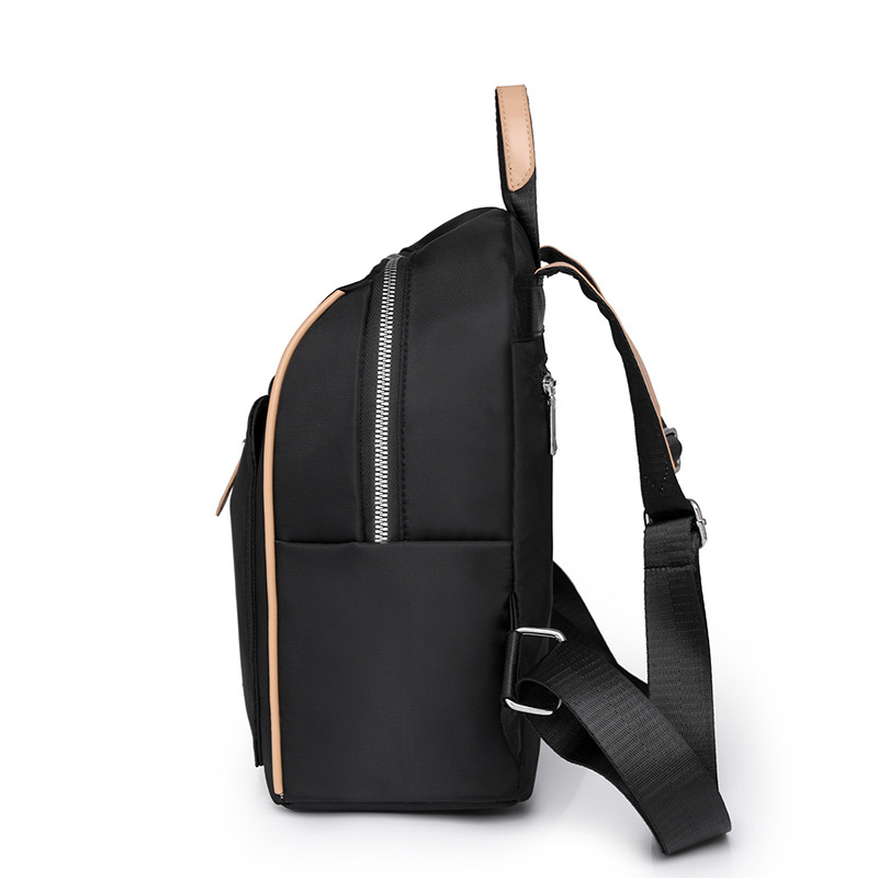 Mochila de nailon para mujer 2024 nuevo estilo casual mochila escolar de color sólido moda color de contraste ligero y versátil mochila de viaje de viaje