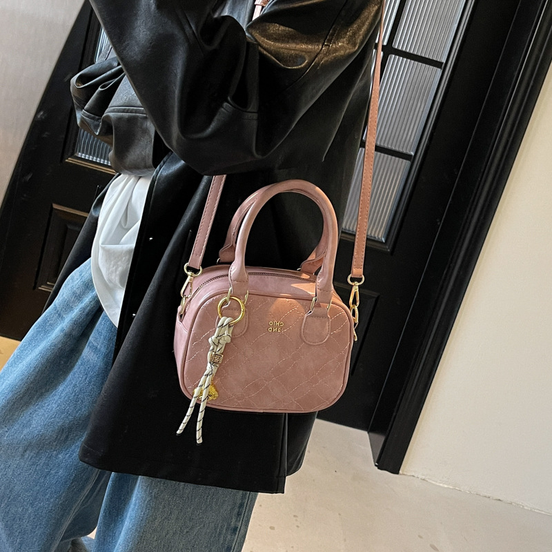 Este año, la popular explosión de bolsos de mano para mujeres 2025, nueva moda universal, bolsos de hombro, bolsos de béisbol de moda de textura