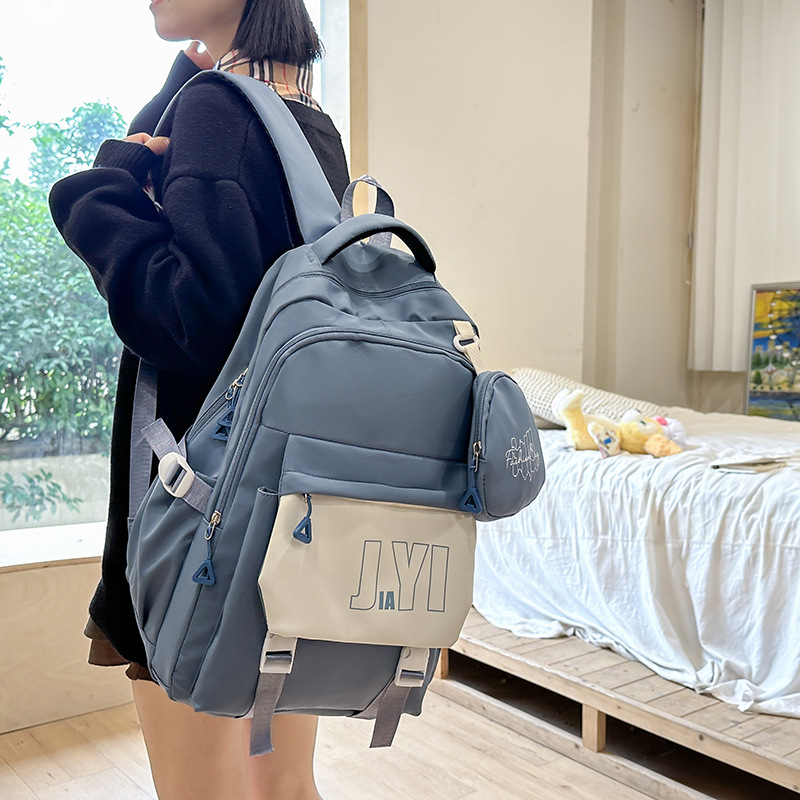 Mochila de tendencia JIAYISTAR espalda de alta capacidad mochila de estudiantes al por mayor transfronteriza mochila escolar ligera