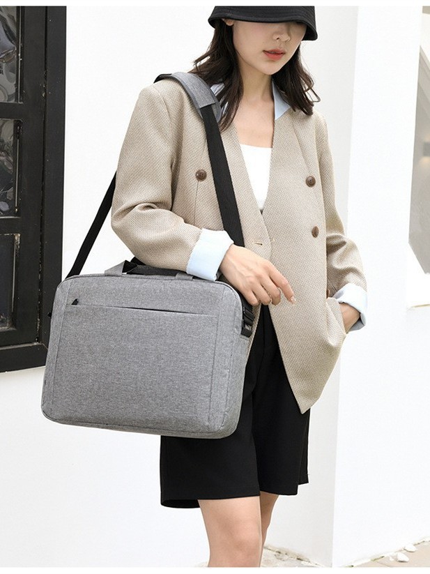 La nueva versión coreana del bolso de computadora de moda, bolso de hombro único para mujeres, mochila portátil ligera y multifuncional para hombres image 4