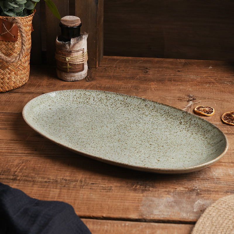 Transfronterizos exclusivos para cubiertos de hotel retrógrados grandes platos de cerámica de alto valor familiar platos de pescado al vapor elípticos