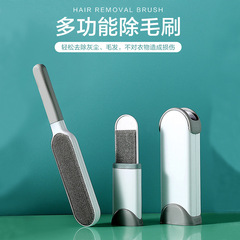 毛ブラシの静電は毛ブラシを除いてウールのカシミヤのコートの服の衣類を吸います。