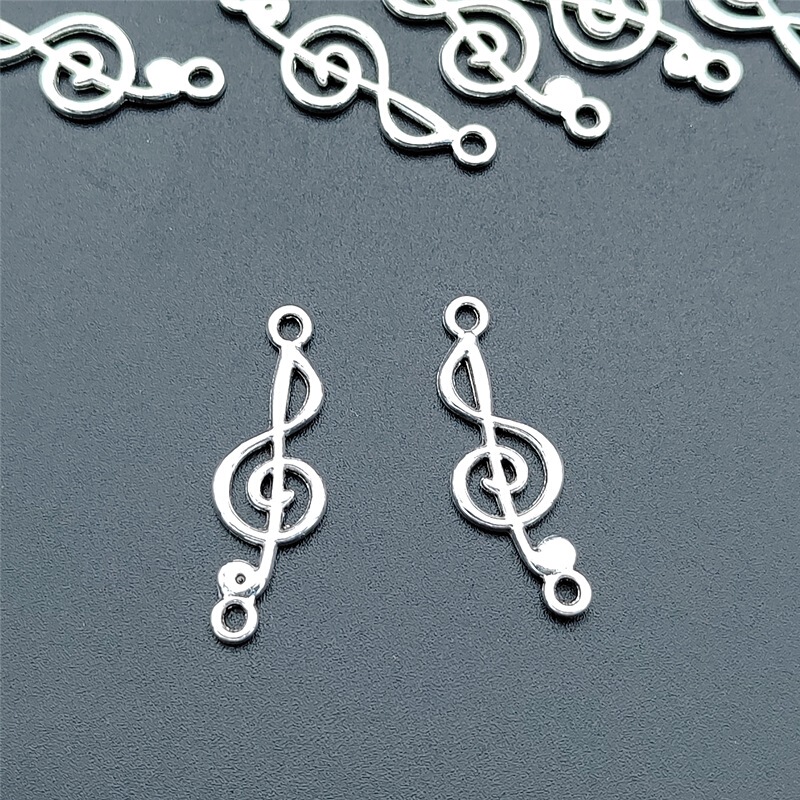 European and American fashion DIY alloy accessories 40MM double hanging hollow hole music symbol bracelet connection body wholesale
