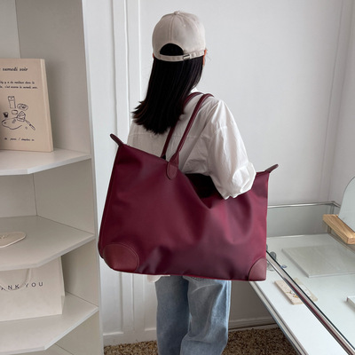 2022夏季新款休闲大容量手提旅行包短途单肩行李袋轻便运动健身包