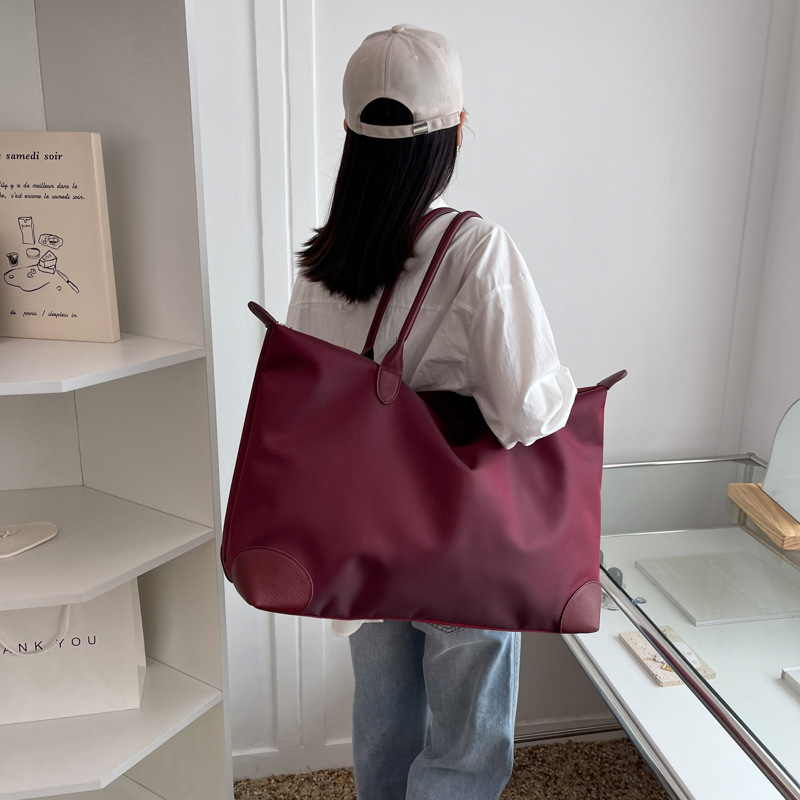 2022夏季新款休闲大容量手提旅行包短途单肩行李袋轻便运动健身包