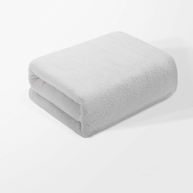 Hotel salón de belleza baño masaje tienda de pies Toalla de baño al por mayor Toalla de baño de color sólido de terciopelo coral toalla traje fuerte absorbente