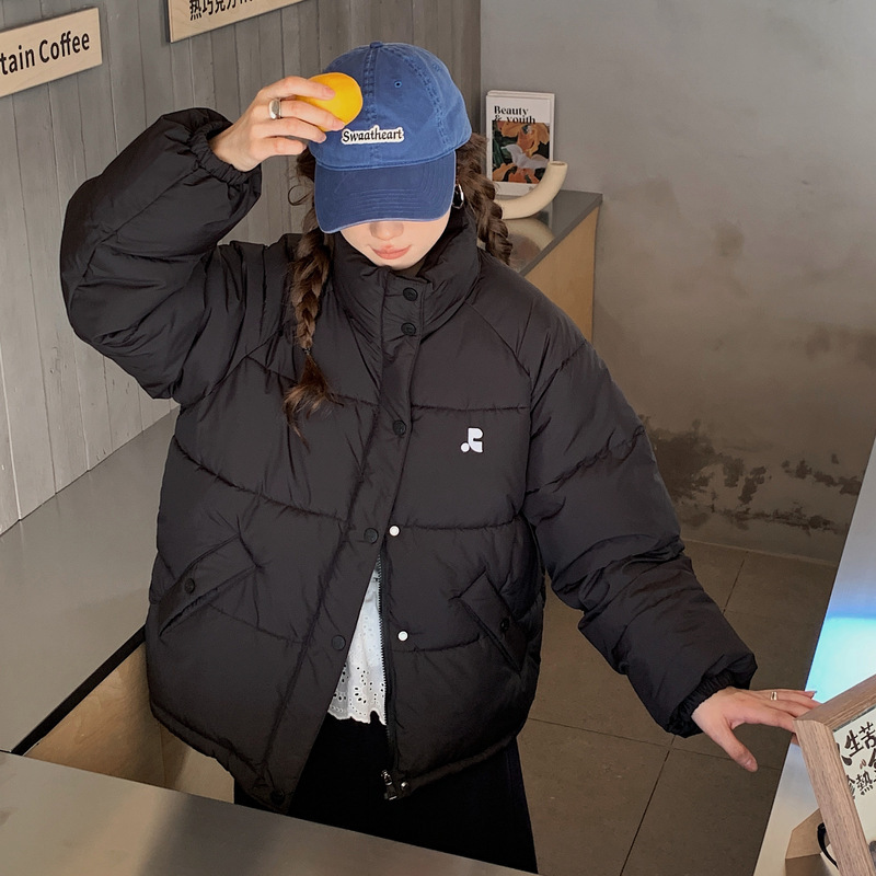 Corea del invierno 2025 nuevo pan plumón ropa de algodón mujer corta pequeña chaqueta de algodón de cuello holgado coreano