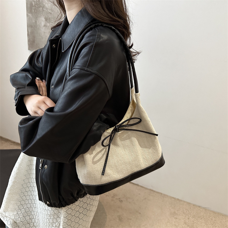 2024 nuevo nicho coreano retro empalme tela bolsa de mano bolso de hombro de gran capacidad bolso de brazo