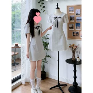韩系温柔氛围感穿搭白色娃娃领连衣裙特别漂亮掐腰小裙子2026夏季